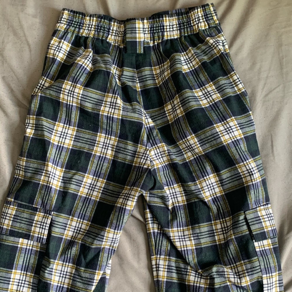 dark green, white, & yellow slacks